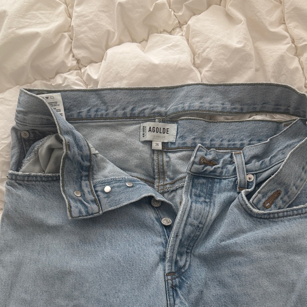 Agolde Sky Blue Denim Jeans with a cute wrap at the top.